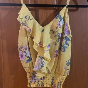 Women’s small yellow blouse with flowers